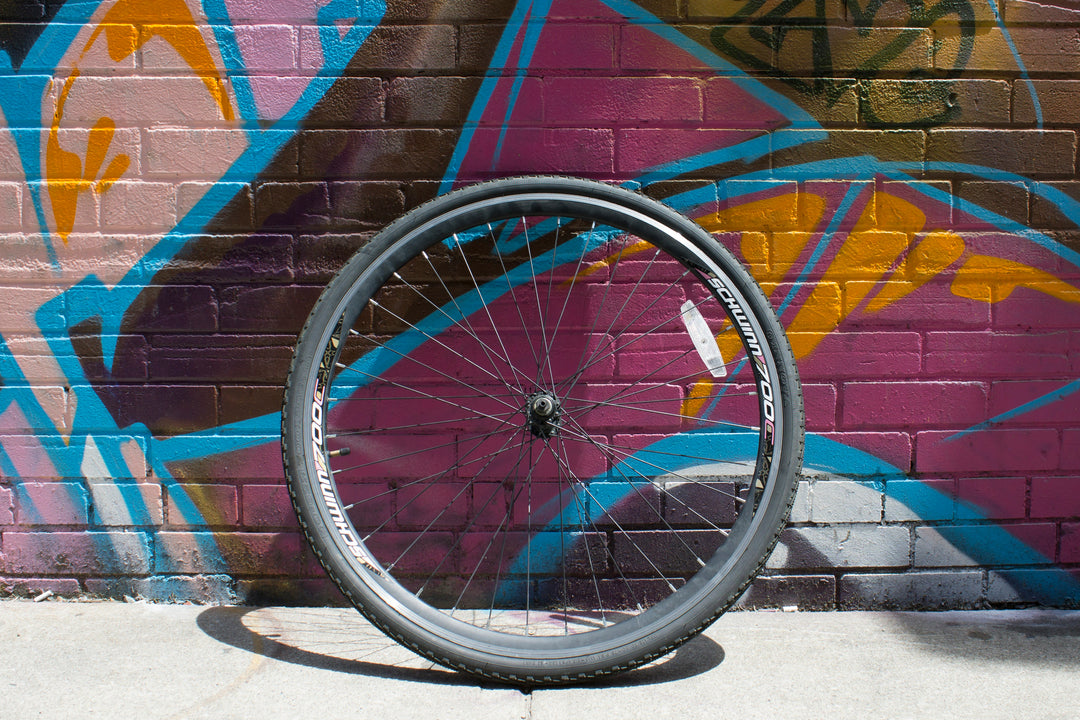Why is the width of a bike tire so important to cyclists?
